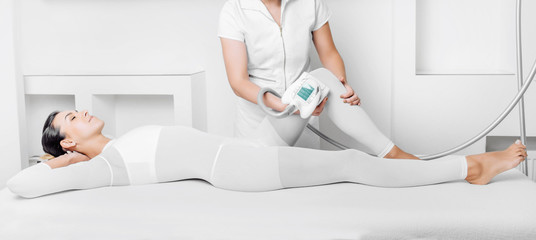 Beautiful woman receiving lpg massage against cellulite on body