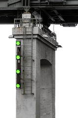 Bridge base through river with traffic light