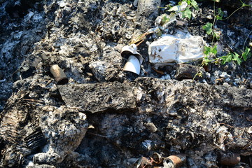 the black ash and the fraction at garbage burning place