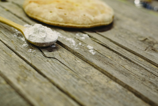 Pizza Calzone on old wooden table