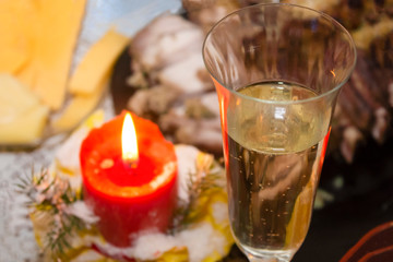 festive champagne with a candle