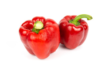 Two bell peppers on white background
