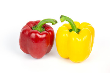 Two bell peppers on white background