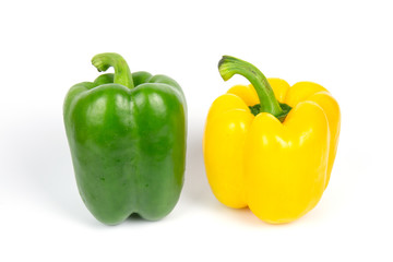 Two bell peppers on white background