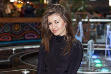 Smiling brunette woman posing