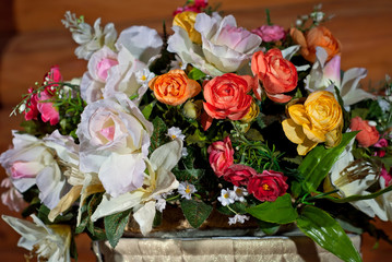 bouquets of white roses and other flowers are decorated with a festive table in the restaurant