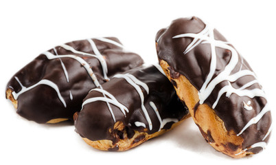 Traditional french eclairs with chocolate isolated on white background