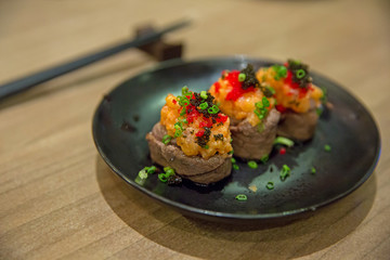 Roasted Wagyu Beef Sushi, in focus selective.