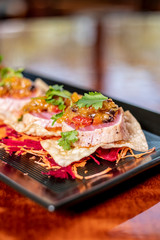 Seared Ahi Tuna Sashimi Appetizer on Wonton Crisp