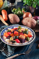 Roasted vegetables with rice on a plate