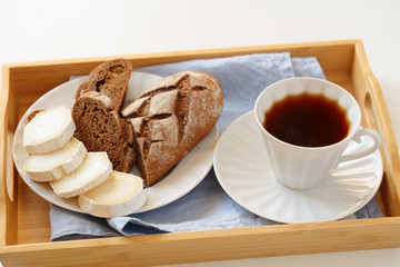 Breakfast with goat cheese and coffee