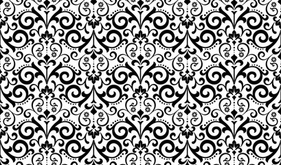 Floral pattern. Vintage wallpaper in the Baroque style. Seamless vector background. White and black ornament for fabric, wallpaper, packaging. Ornate Damask flower ornament