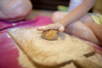 Little girl making cake