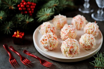 Cheese balls in crab shavings is a traditional Russian snack for Christmas and New Year's party. © chudo2307