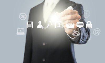 Businessman and  analytics symbol on  background