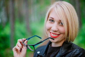 Portrait of a pretty girl in glasses