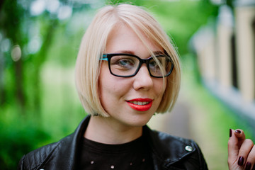 Portrait of a pretty girl in glasses