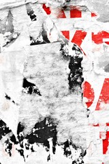 Old grunge ripped torn vintage collage street posters creased crumpled paper surface placard texture background backdrop