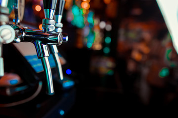 Beer taps in a pub. Close up of beer Tap. Selective focus.