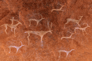 image of ancient hunting on the cave wall. history.era.