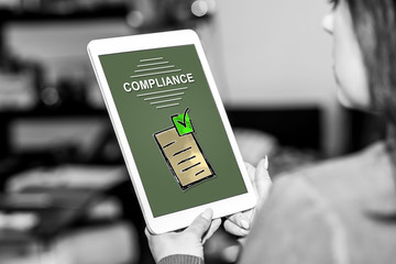 Compliance concept on a tablet