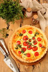 French quiches pie with tomatoes  ,cheese and salmon 