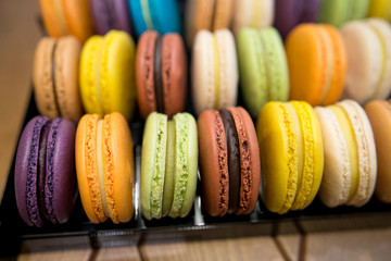 A french sweet delicacy, macaroons variety closeup.macaroon colourful texture.