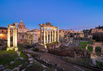 Plakat Rome (Italy) - The archeological ruins of Rome's historic center, named Imperial Fora, in the night. Here the Trajan's Market. 