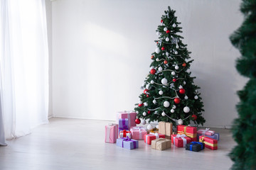 Christmas tree with presents, Garland lights new year holiday decor