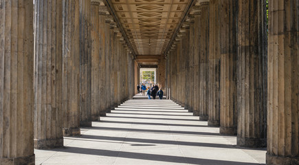 Altes museum, on Museum Island, Berlin, Germany. Sun pierces between the columns. © viperagp