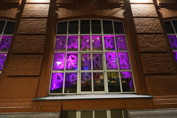 Building facade image. Bright Moscow street at the night time.