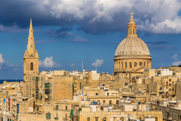 Fototapeta na wymiar Valletta, Malta. View of the city: on the right - the dome of St. Paul's Cathedral, 1844