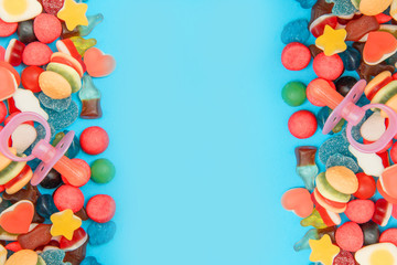 Obraz premium assorted candies on a pastel colored background