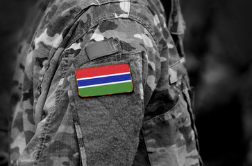 Flag of the Gambia on soldiers arm (collage).