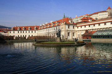 Waldstein palace garden (Valdstejnska Zahrada) and building of the Senate of Czech Republic in Prague. A pond with The Hercules' Fountain