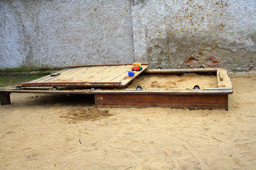 Wooden sandbox on the children's playground