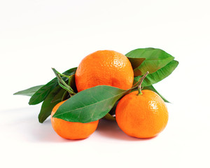 mandarin with a leaf isolated over white background