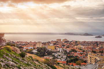 Fototapeta na wymiar Aerial View at dawn on the Marseille City and its Harbor, France