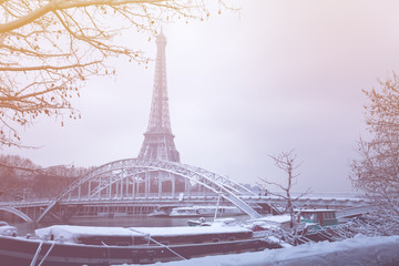 Debilly footbridge and the Eiffel Tower in snow