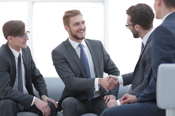 handshake business people in the office.