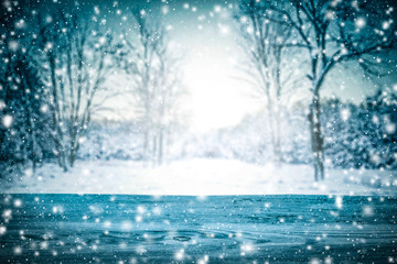 A winter wooden table in a very cold and snowy day  