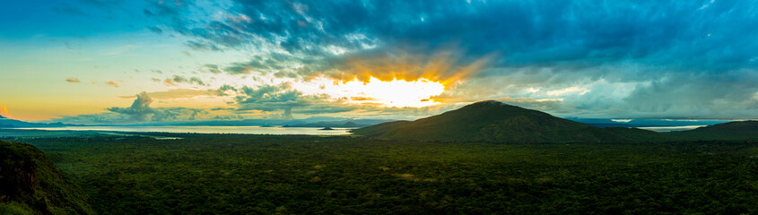 180 degree panorama of sunrise over the rain forest of Nechisar National Park, Ethiopia.