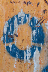 blue stencil painted on rusty  texture, blue stencil painted on rusty background, letter o