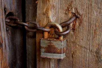 padlock on old wooden door