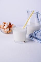 Glass of milk and cookie composition isolated over the white background