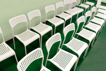 Obraz premium New white chairs are in the room for the audience of children's holiday