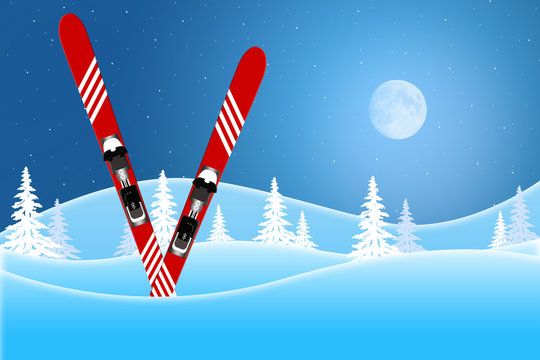 Blue winter scene of red skis standing in snow covered hills under a moon lit sky