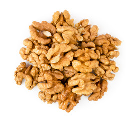 Pile of peeled walnut on a white. The view from the top.