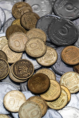 Ukrainian coins isolated on black background. Close-up view. Coins are located in the center of frame. A conceptual image.