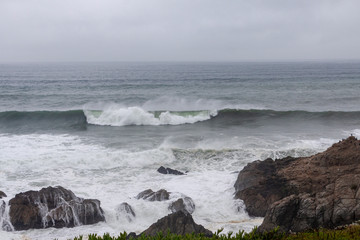 waves crashing on rocks